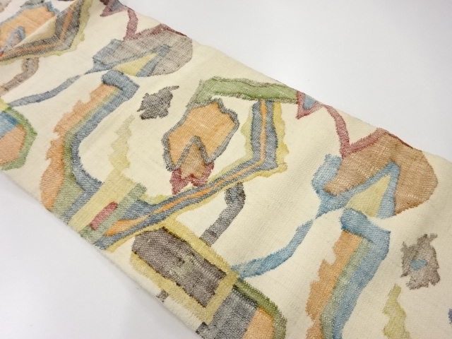 アンティーク　手織り真綿紬抽象花唐草模様織出し名古屋帯
